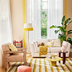 Yellow interiors Living room cream sofa 