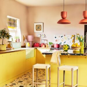 Yellow kitchen with stone floor 