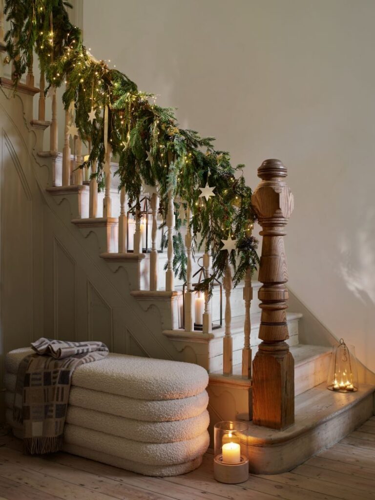 House Beautiful  Christmas Scandi Hallway foliage bannister garland